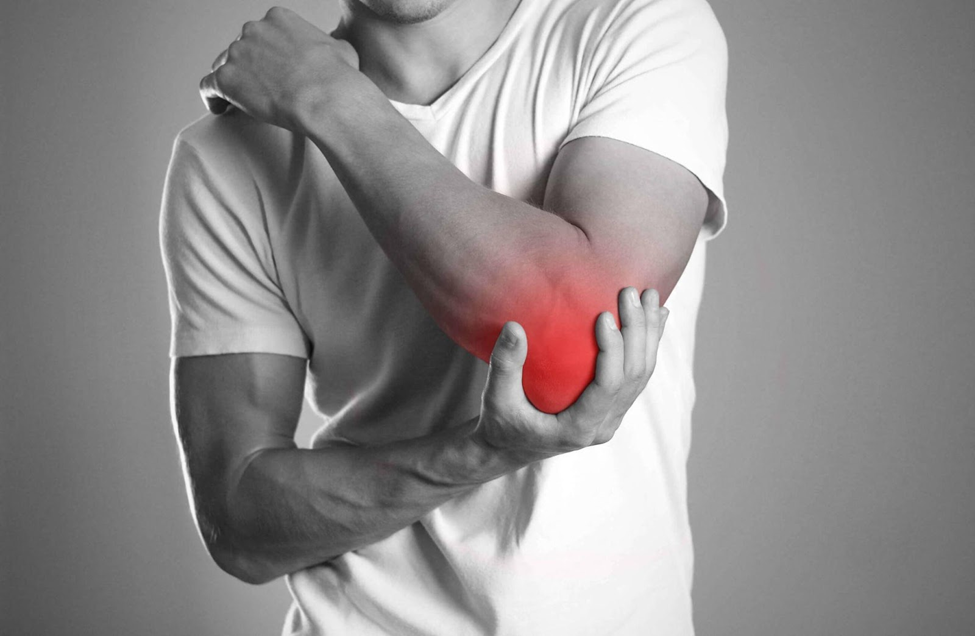 man-holding-elbow-with-severe-pain