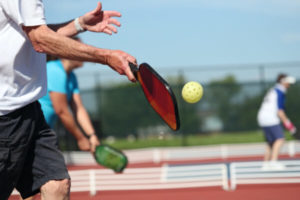 old-man-playing-pickleball-sports